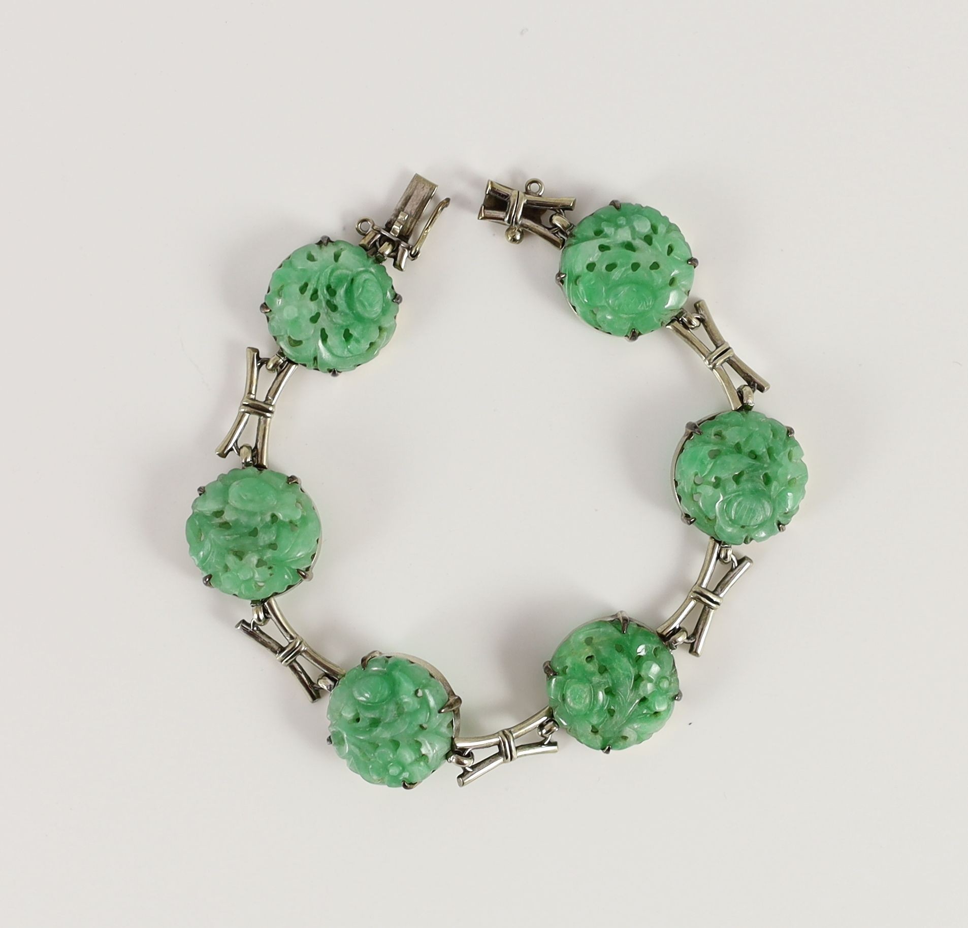 A mid 20th century 9ct white gold and jadeite set bracelet, in original Liberty & Co. fitted box